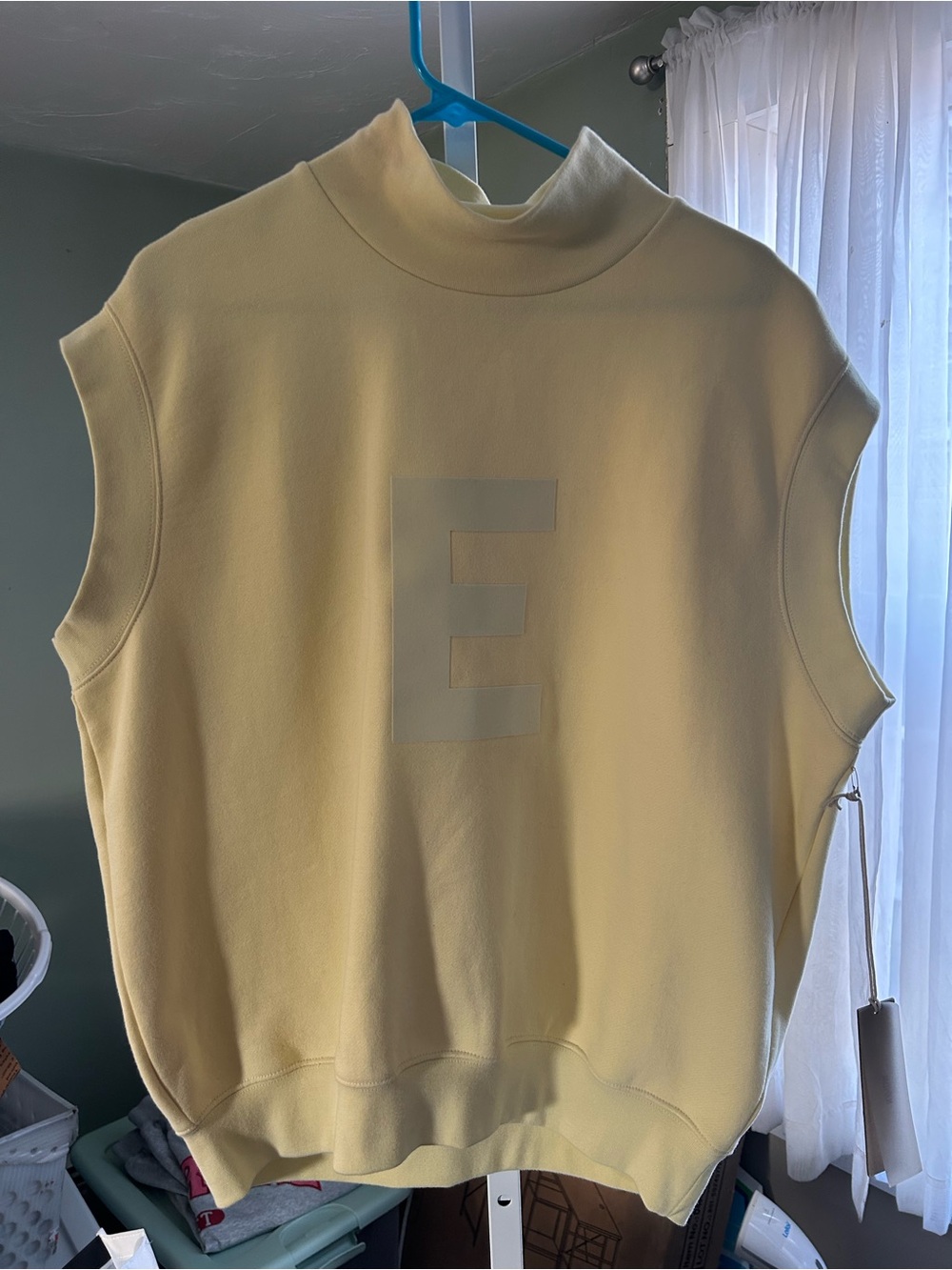 Essentials Womans Pale Yellow Sleeveless Sweatshirt